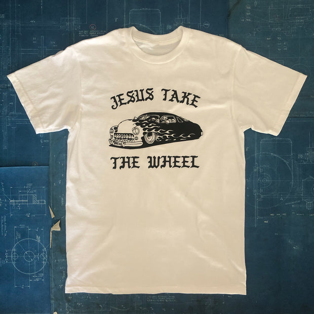 A "JESUS TAKE THE WHEEL" TSY x MUCHOMOTO T-SHIRT, WHITE